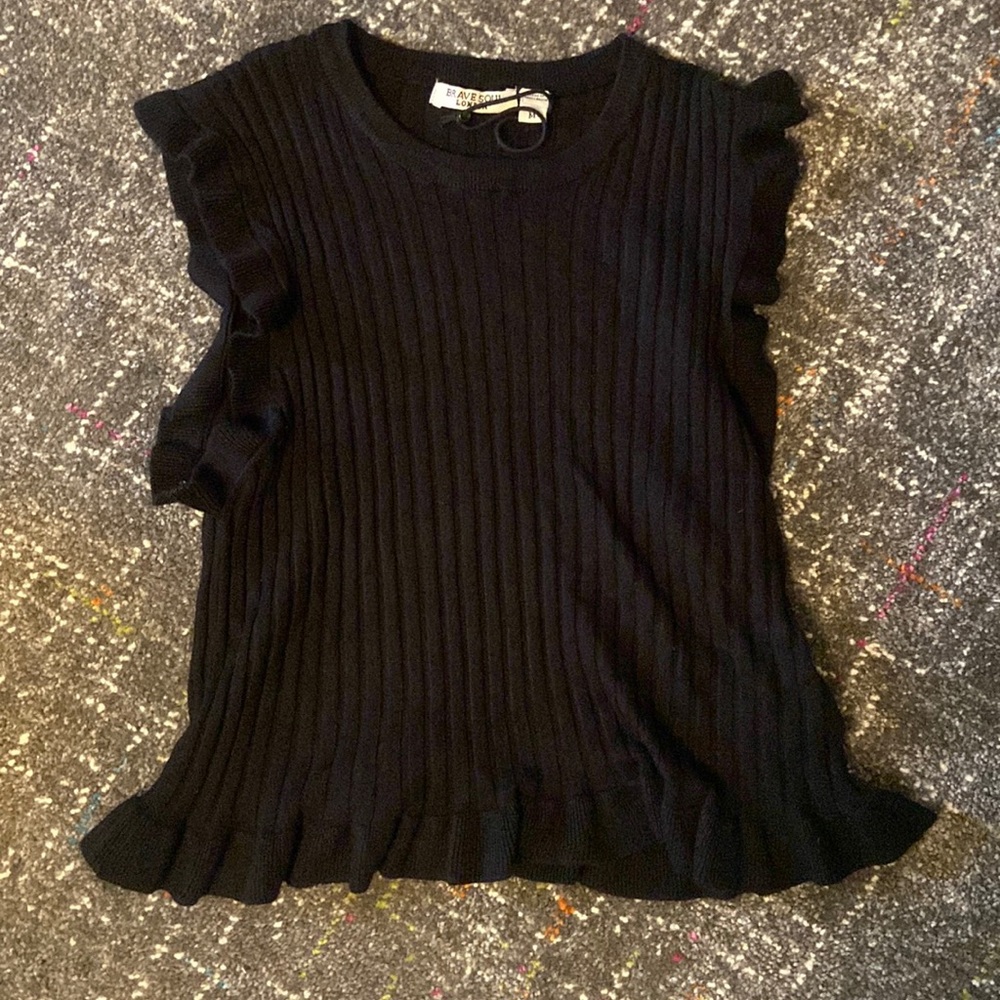 A cute, very soft and classy ruffled tank top.